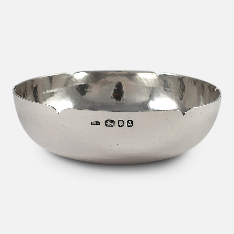 the bowl with the silver hallmarks to the front