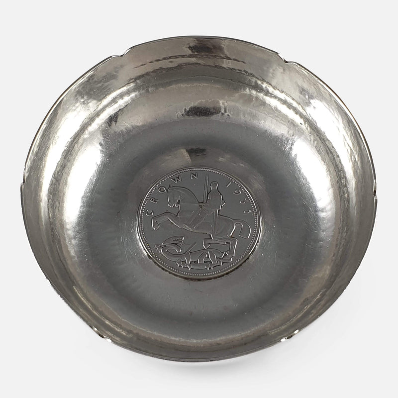 a birds eye view of the bowl with central coin displayed