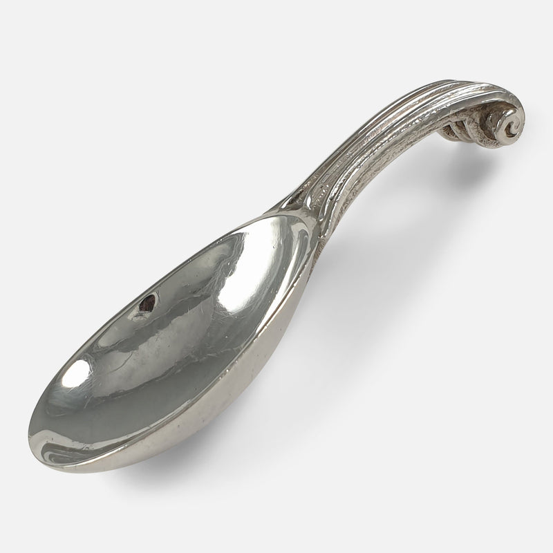 the side of the spoon viewed diagonally