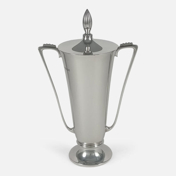 the Sterling Silver Trophy Cup and Cover by A. E. Jones viewed from the front
