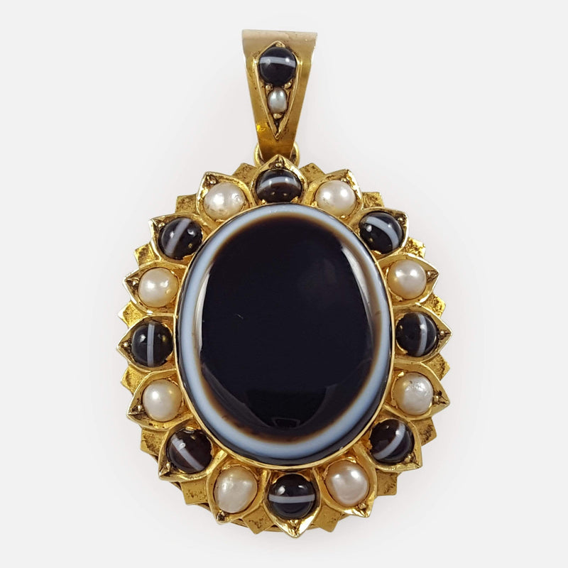 the Victorian 15ct gold banded agate and pearl mourning locket viewed from the front