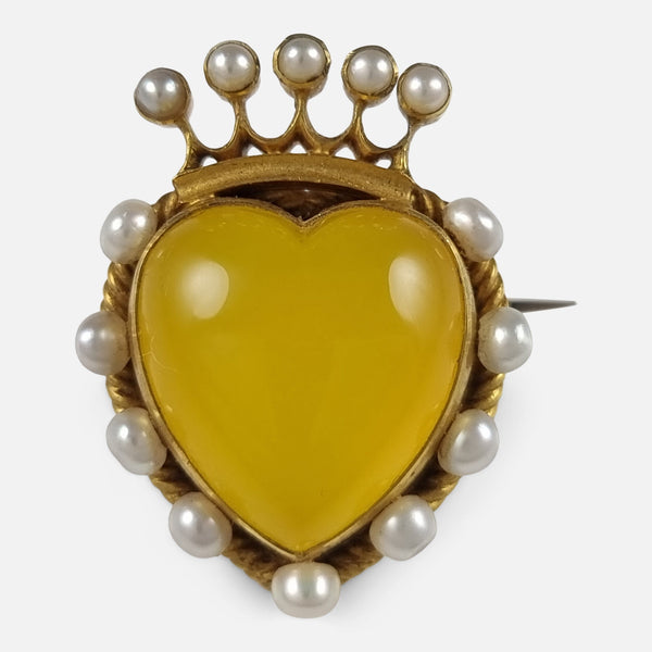 the Victorian 15 carat gold Chalcedony and seed pearl heart brooch viewed from the front