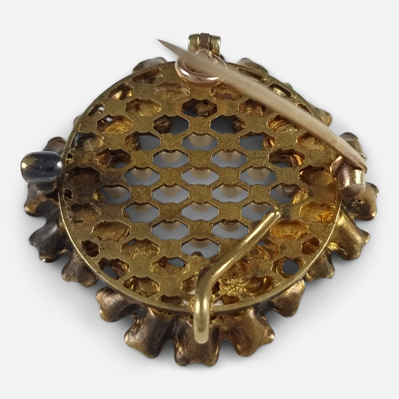 the brooch viewed from the back with pin unfastened