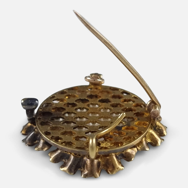 the brooch viewed from the back with pin unfastened