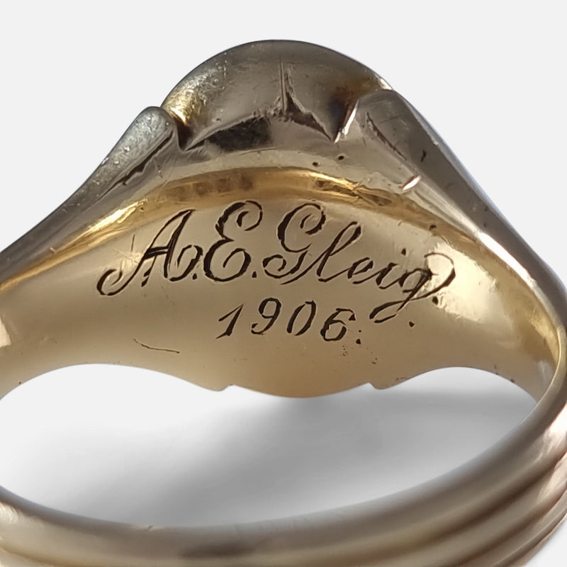 focused in on the inscription to the inside of the ring