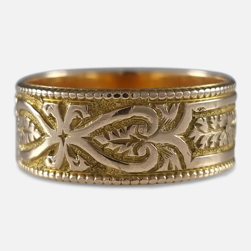 the ring with a section of the engraved decoration in focus