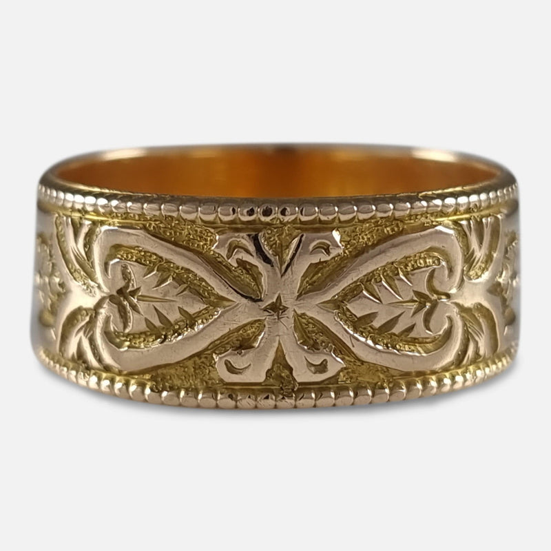 the ring with a section of the engraved decoration in focus