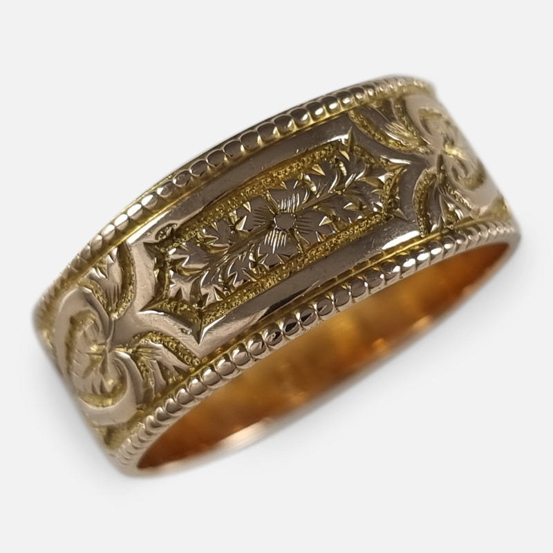 a diagonal view of the gold ring