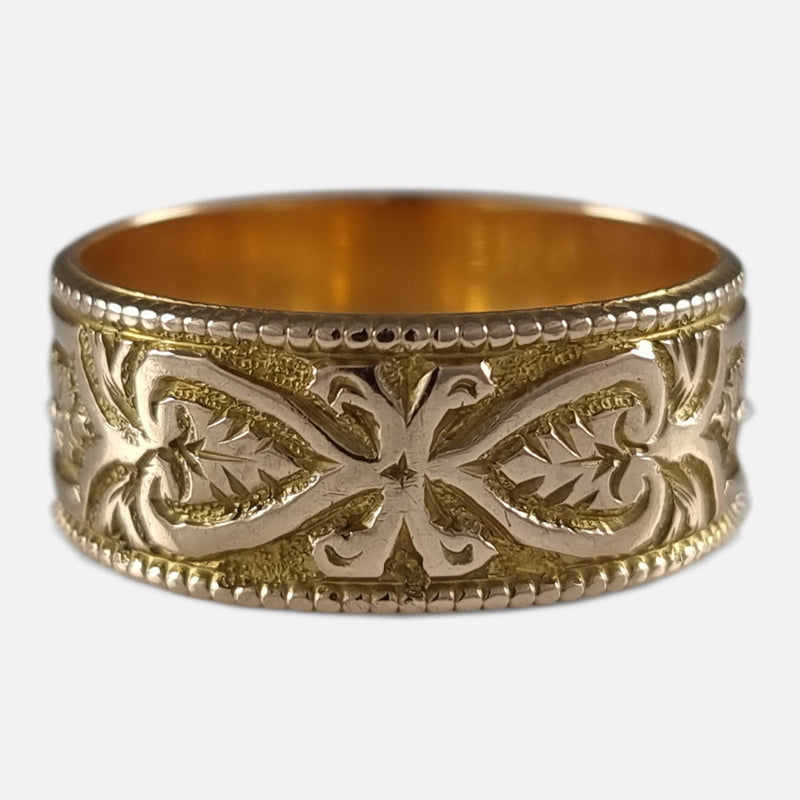 the ring with a section of the engraved decoration in focus