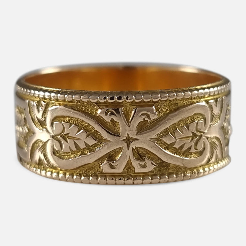 the ring with a section of the engraved decoration in focus