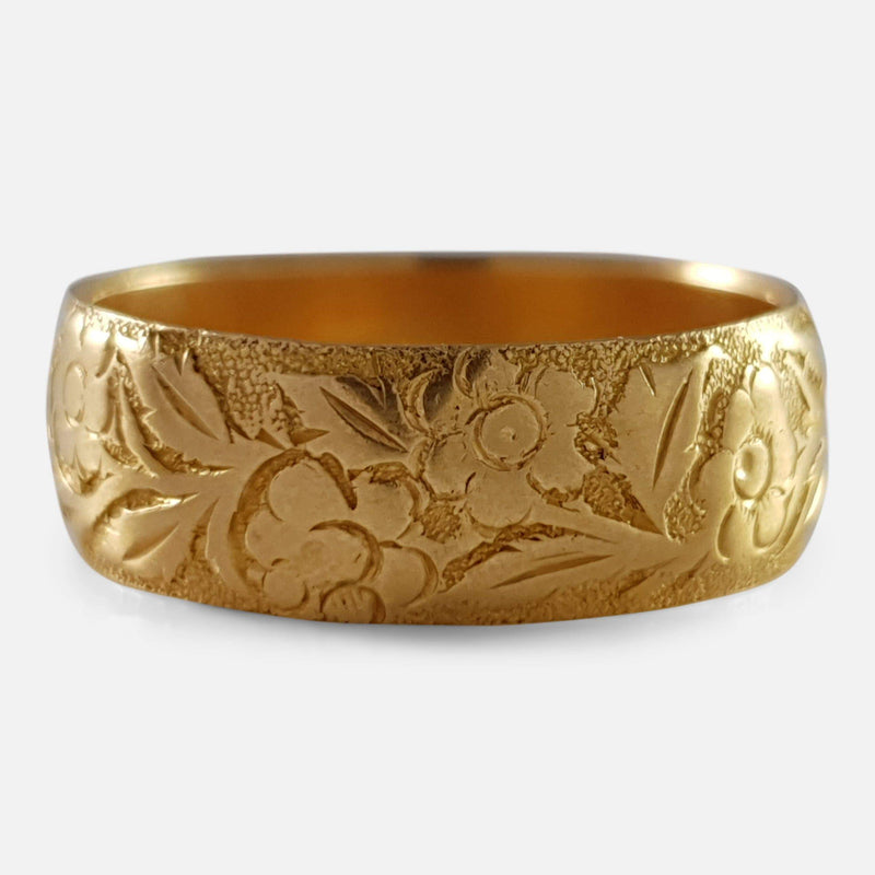 the Victorian 18ct gold foliate engraved wedding band viewed from the front