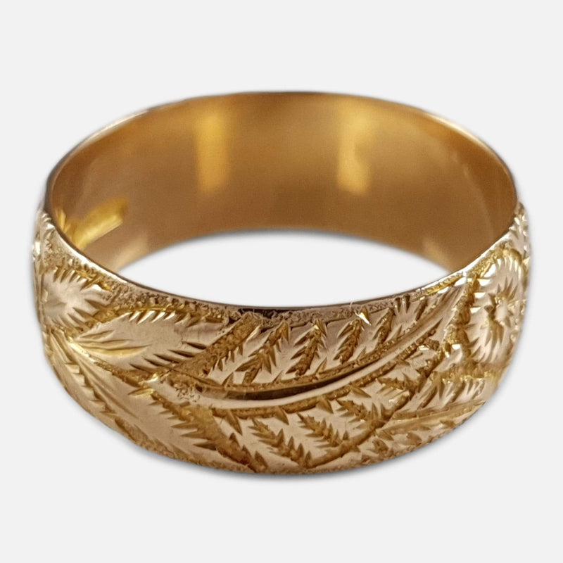 Foliate Engraved Wedding Band viewed from a raised position