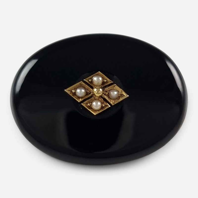 a birds eye view of the antique brooch