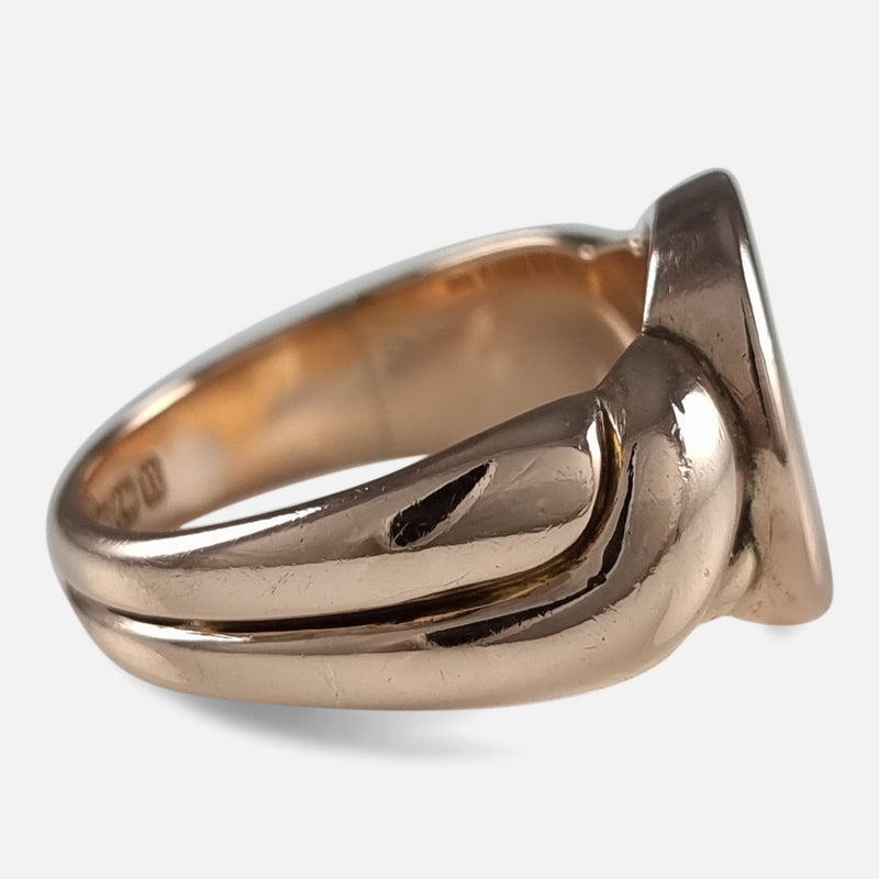 a side on view of the gold ring