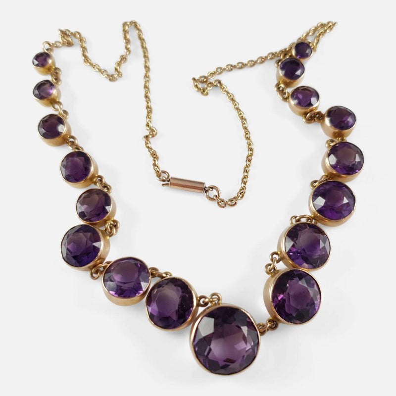 the necklace with amethysts in focus