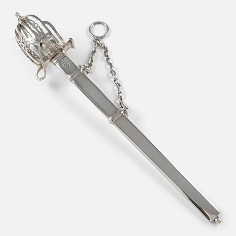 the letter opener viewed diagonally, and in scabbard