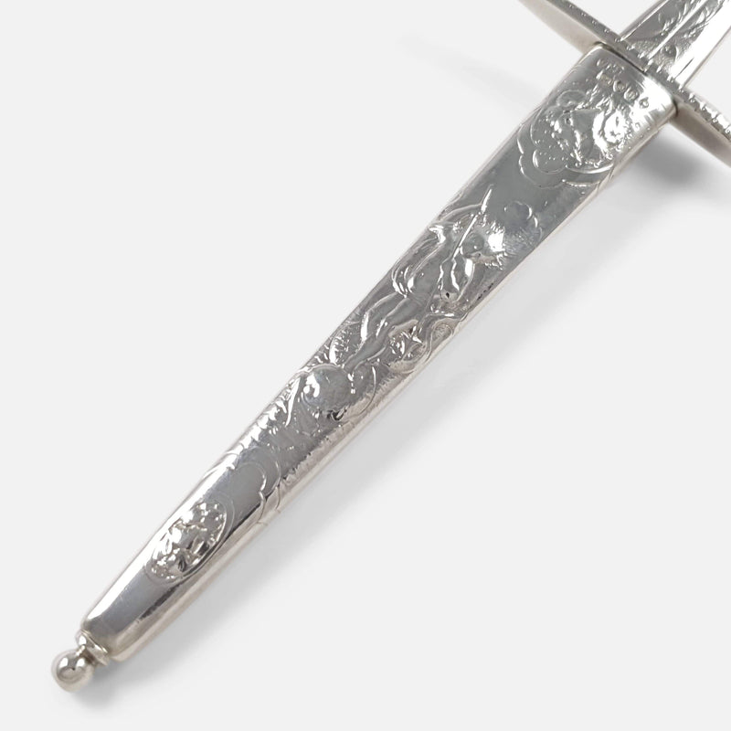 focused on a section of the scabbard decoration viewed diagonally