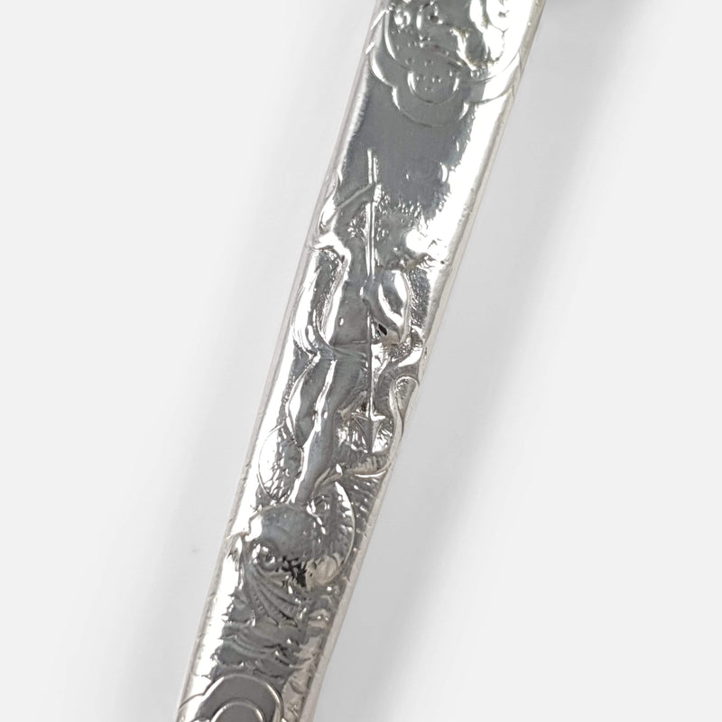 focused on a section of the scabbard decoration