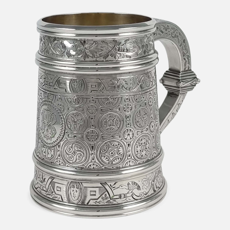 the mug with handle in the background angled slightly towards the right