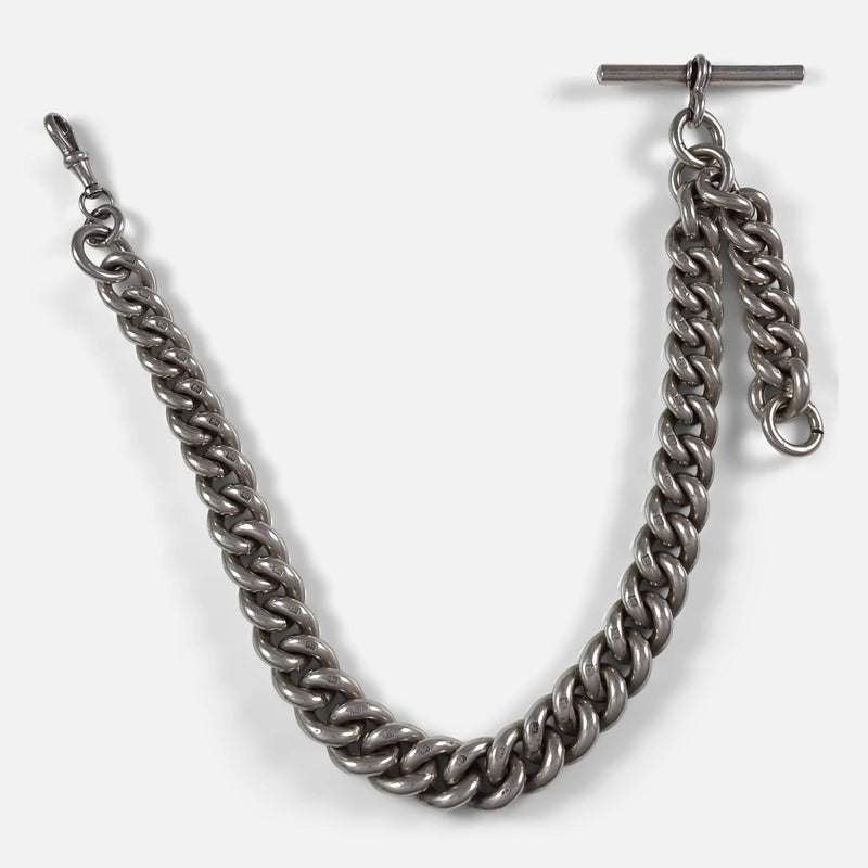 the silver watch chain laid out as it was originally intended to be worn