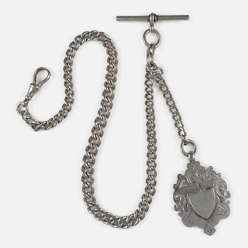 a birds eye view of the silver albert watch chain and fob